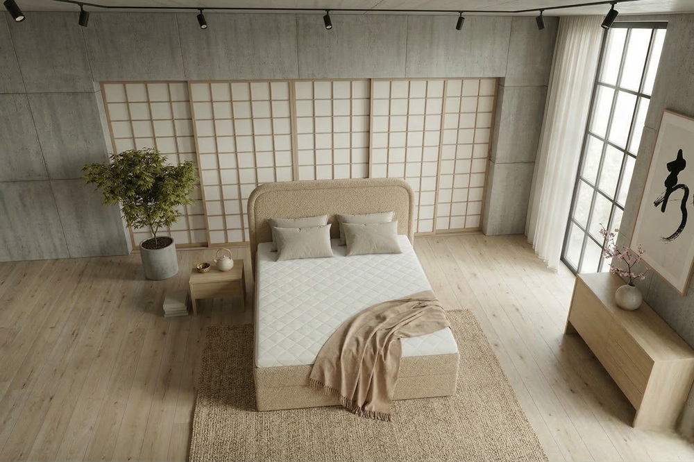 Nowoczesne łóżko tapicerowane Lobo w jasnej, teksturalnej tkaninie typu plecionka z zaokrąglonym wezgłowiem.